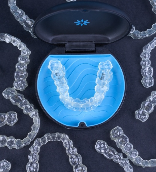 Invisalign clear braces trays and carrying case