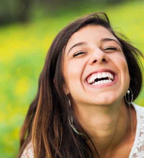 Woman sharing gorgeous smile after makeover