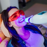patient getting teeth whitening in Naples