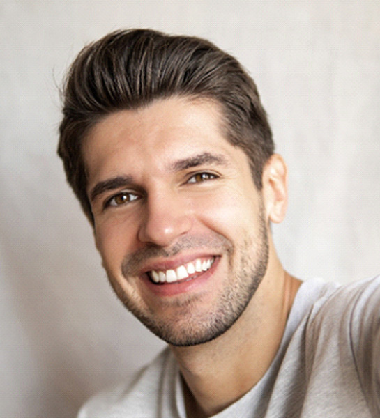 a man smiling after getting teeth whitening in Naples