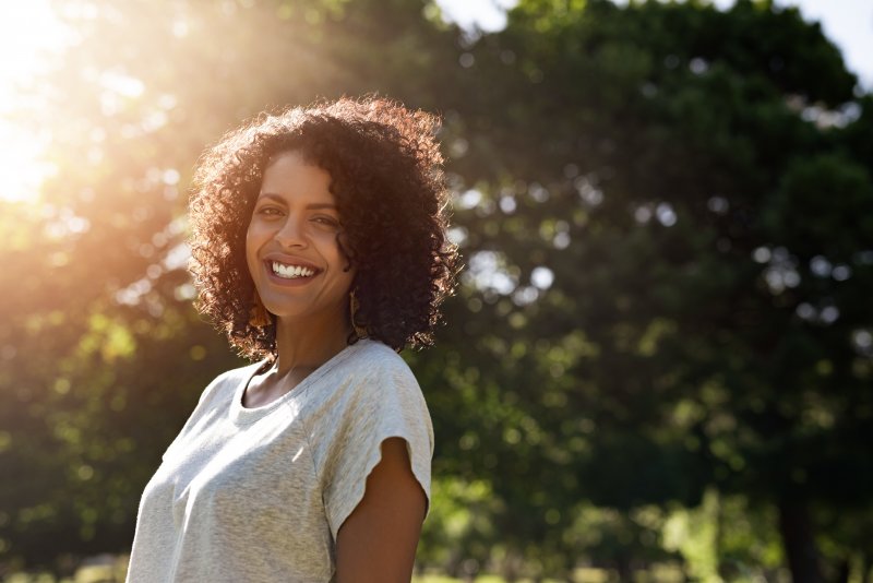 Woman smiling outside