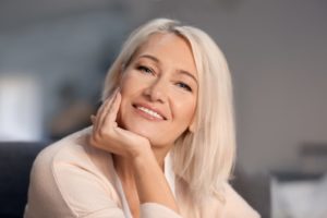 woman smiling with dental implants