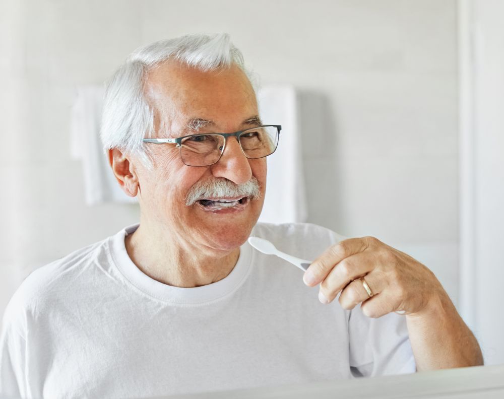 A man brushing his teeth
